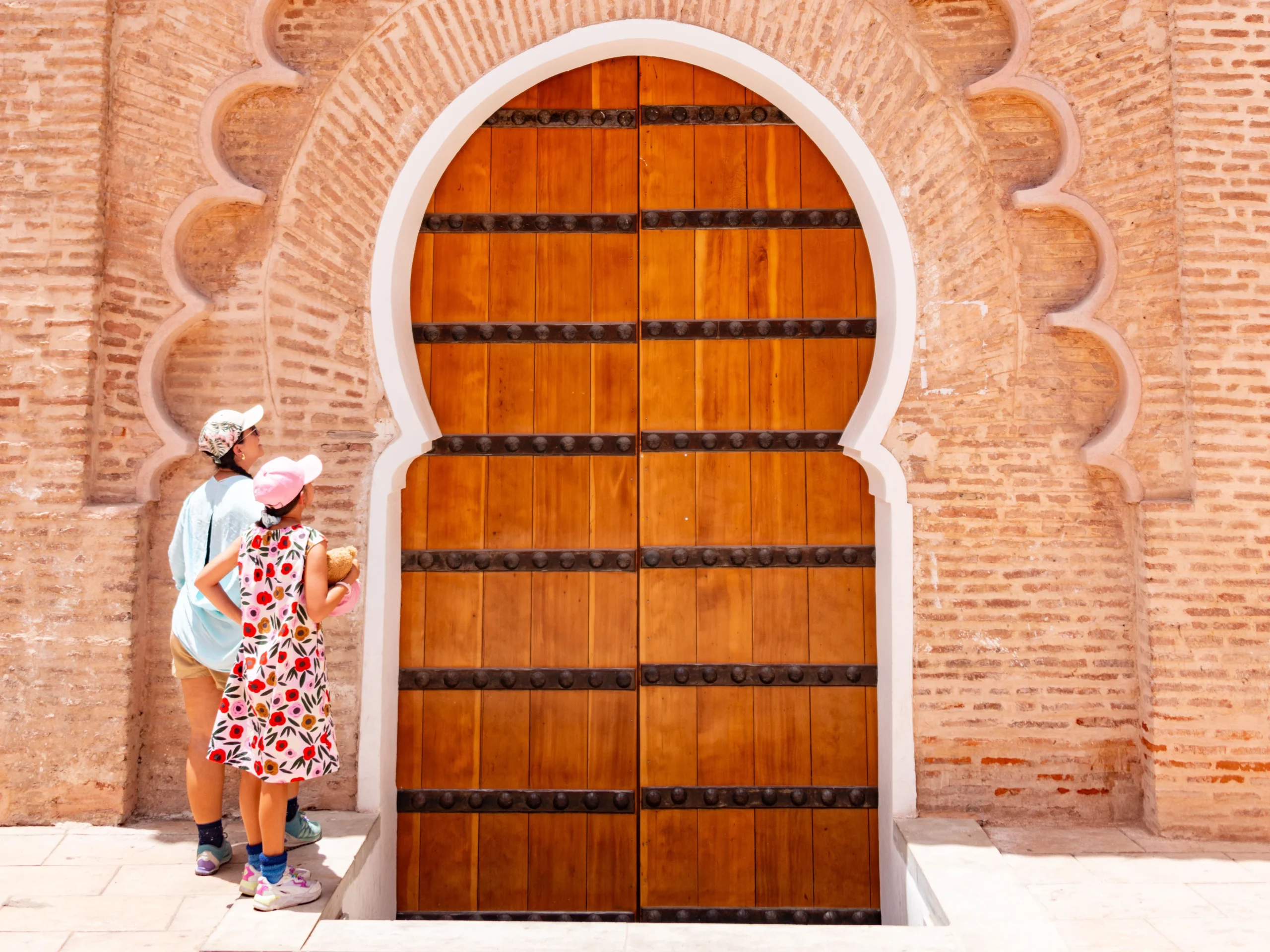 Marrakech Traveler stand in front of El Koutoubia Door