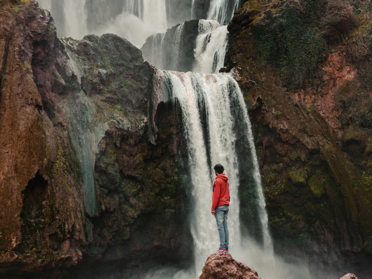 Traveler standing in front of Ouzoud Waterfalls
