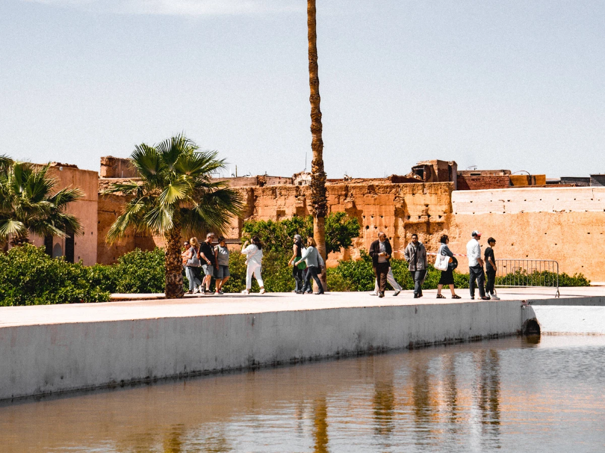 Travelers in El badii Palace