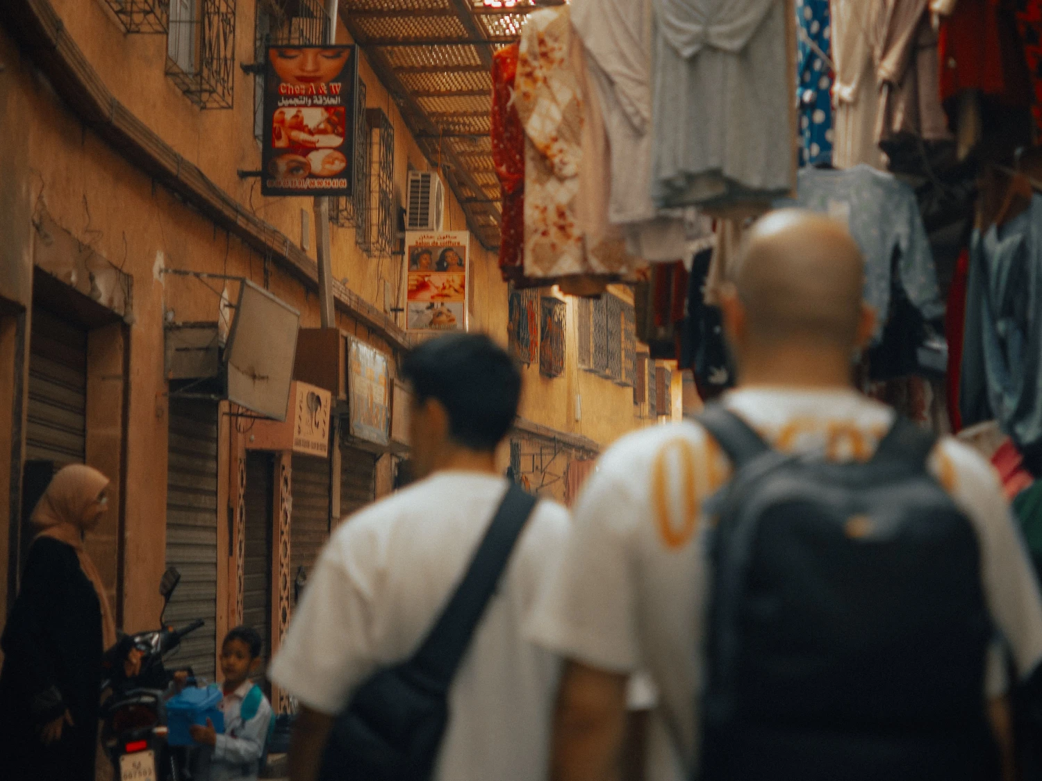 Travelers walking in Medina Marrakech