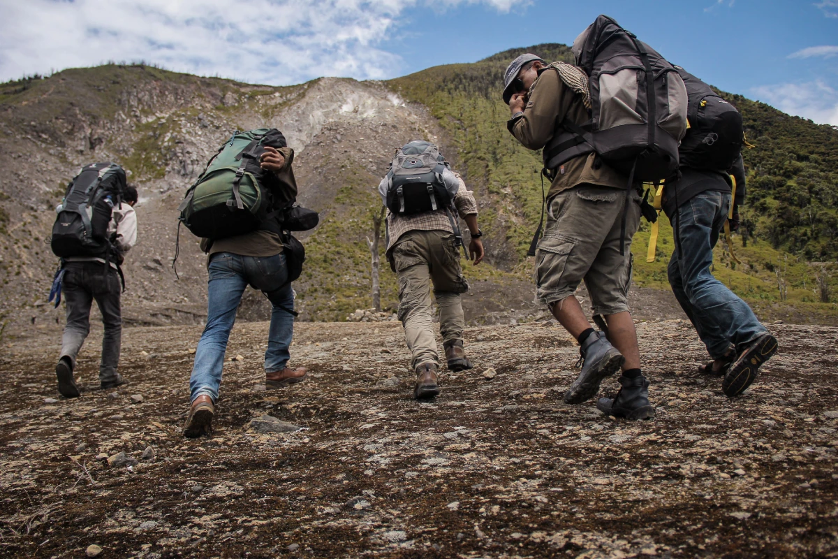 Group of Travelers with bagpacks Enjoy the Atlas Hikking