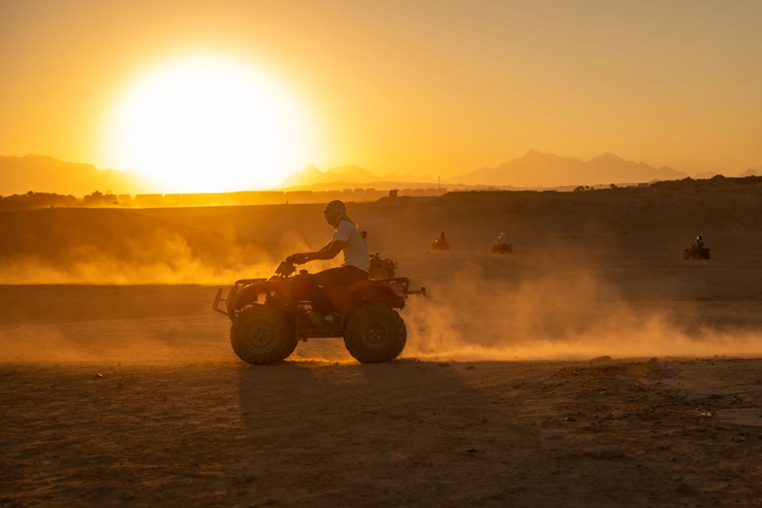 Traveler Bike Quad at sunset in the desert