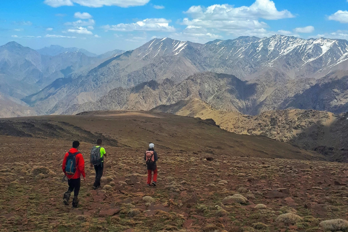 Travelers Hike through the Atlas Mountains