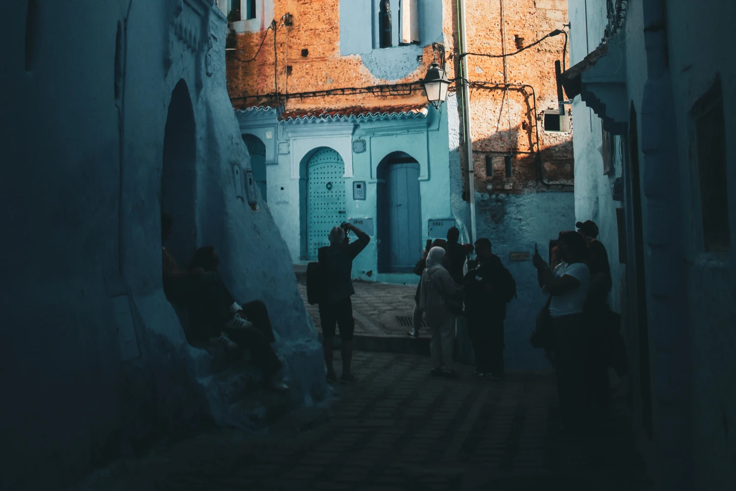 Travelers enjoy the walking the tour in Chefchaouen